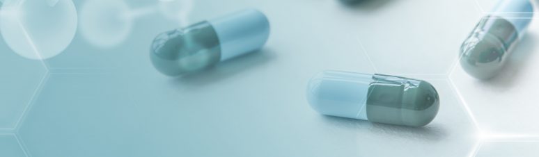 Medicine capsules global health with geometric pattern digital r